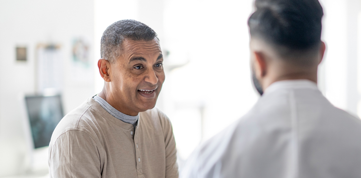 smiling patient and doctor